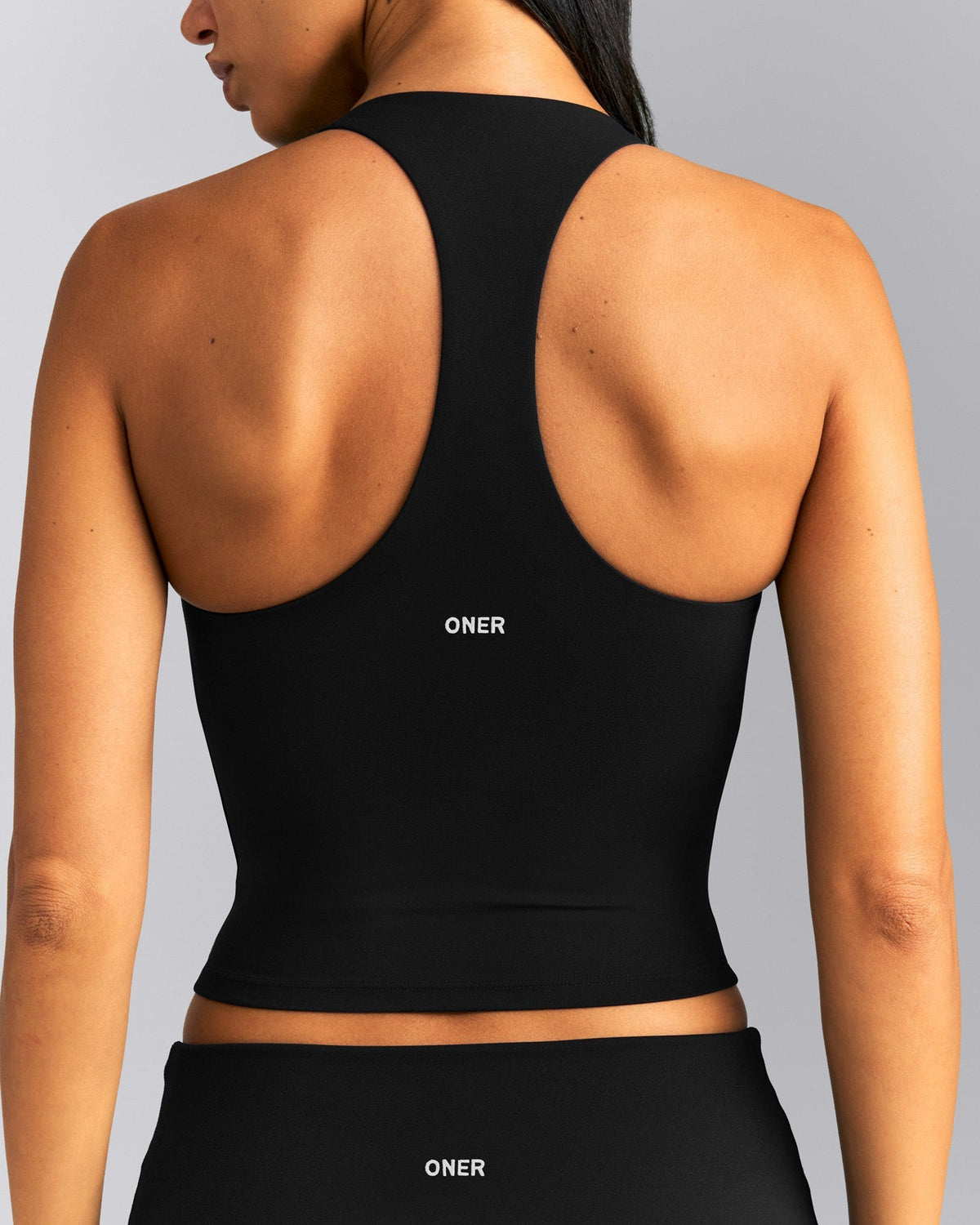 Oner Active SoftMotion™ Racer Back Mid Tank Top with Built in Bra Shelf | Black