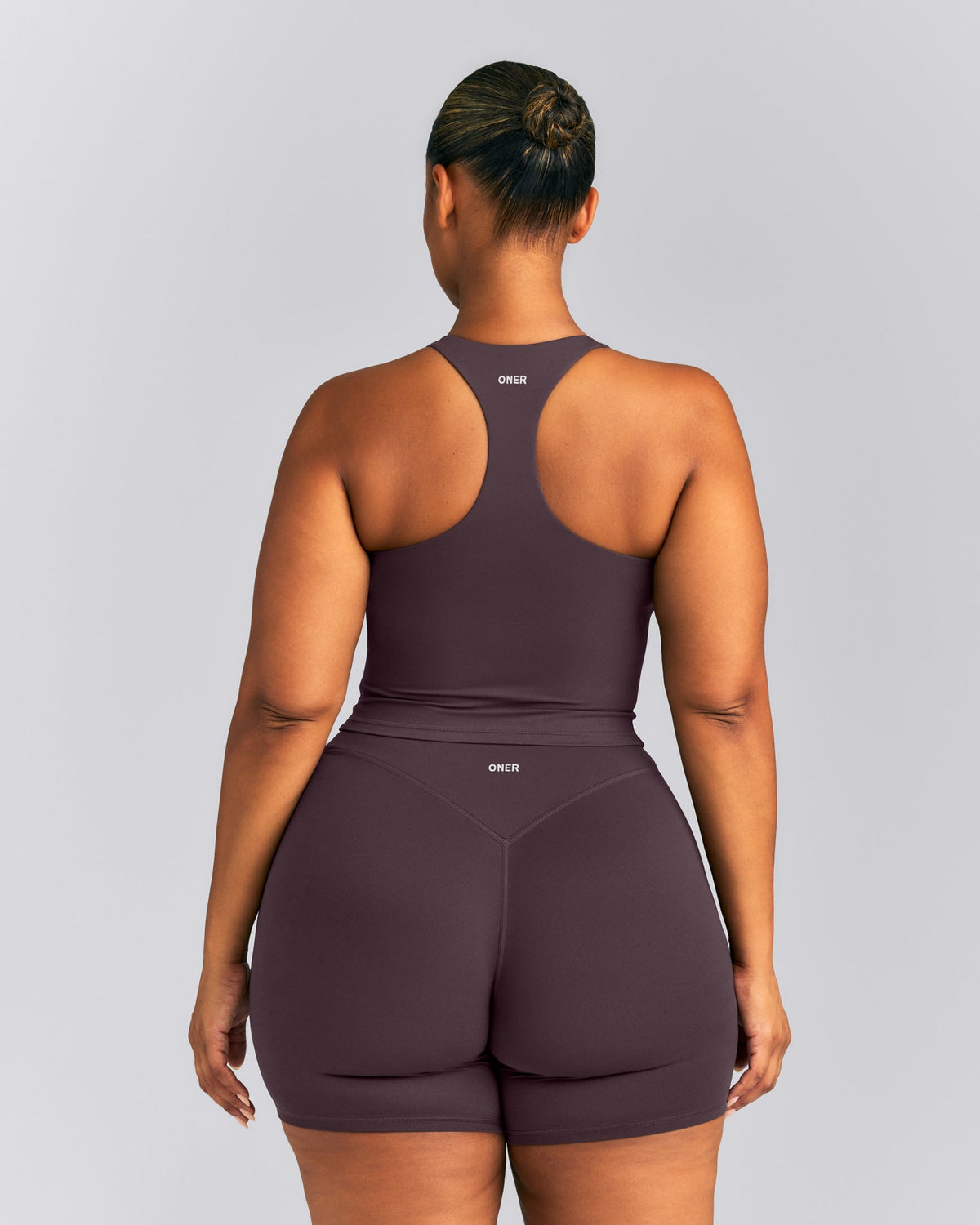 Oner Active SoftMotion™ Racer Back Mid Tank Top with Built in Bra Shelf | Dark Umber Brown