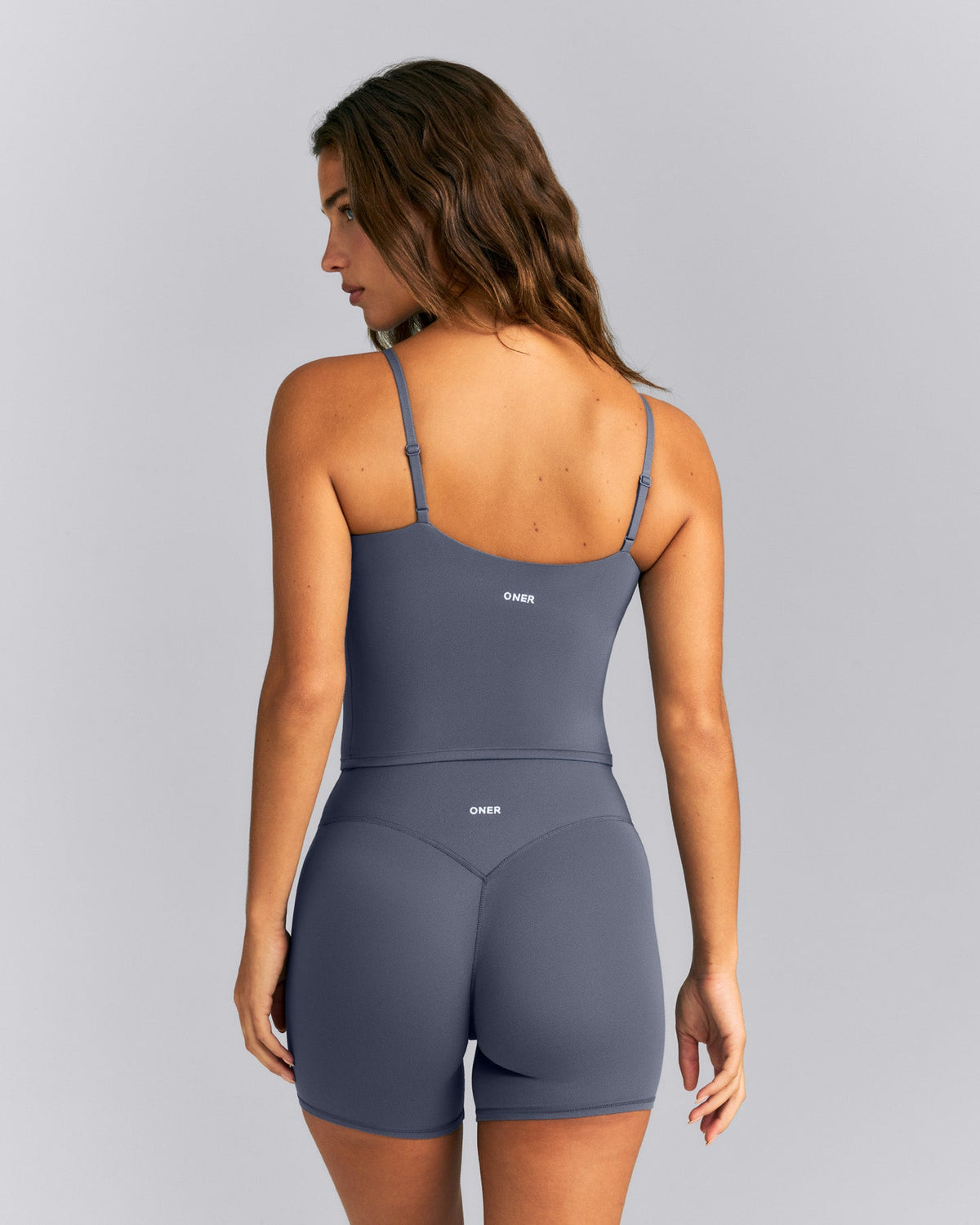 Oner Active SoftMotion™ Adjustable V Neck Mid Tank Top with Built in Bra Shelf | Granite Blue